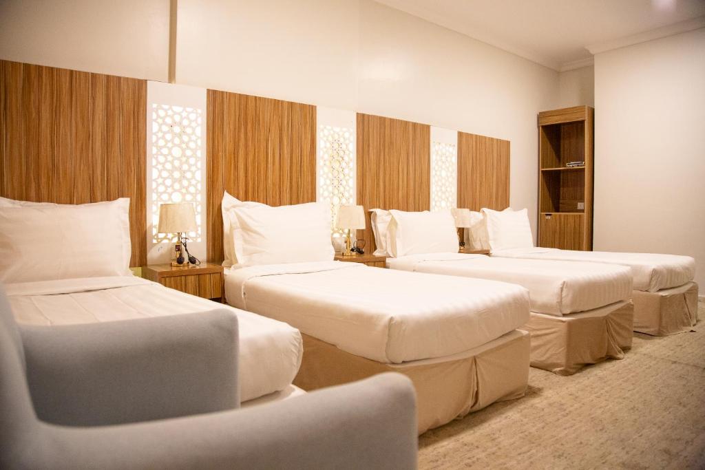 Quad room with four beds at Artal Taiba Hotel