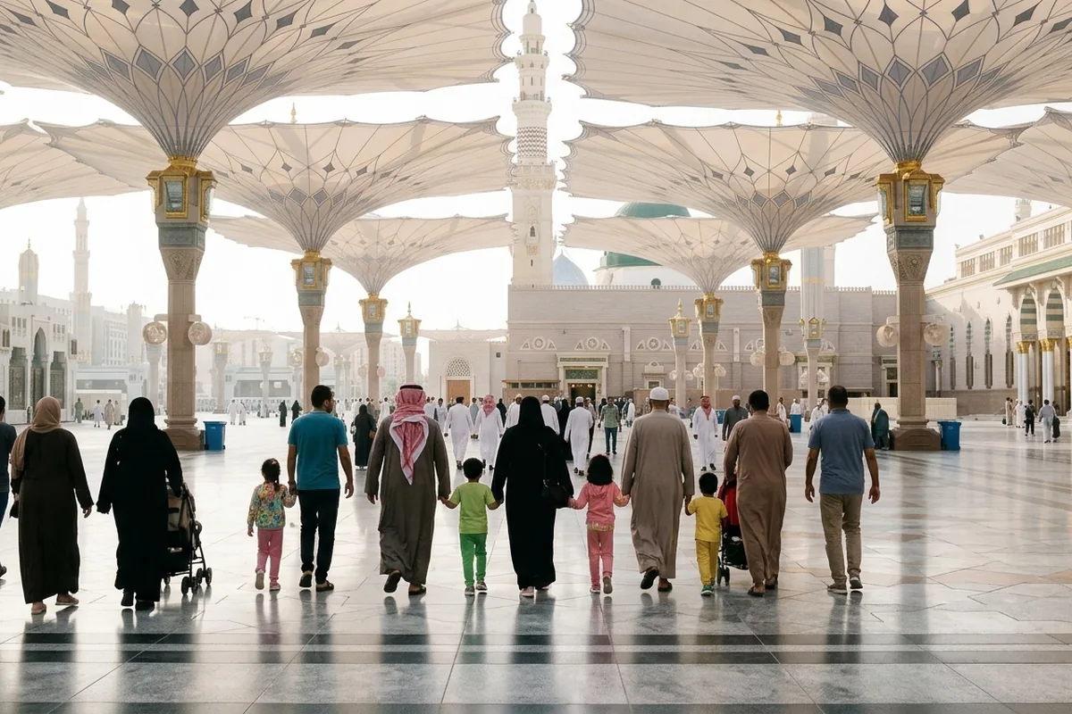 Families walking under the umbrellas of Masjid an-Nabawi on a spring morning