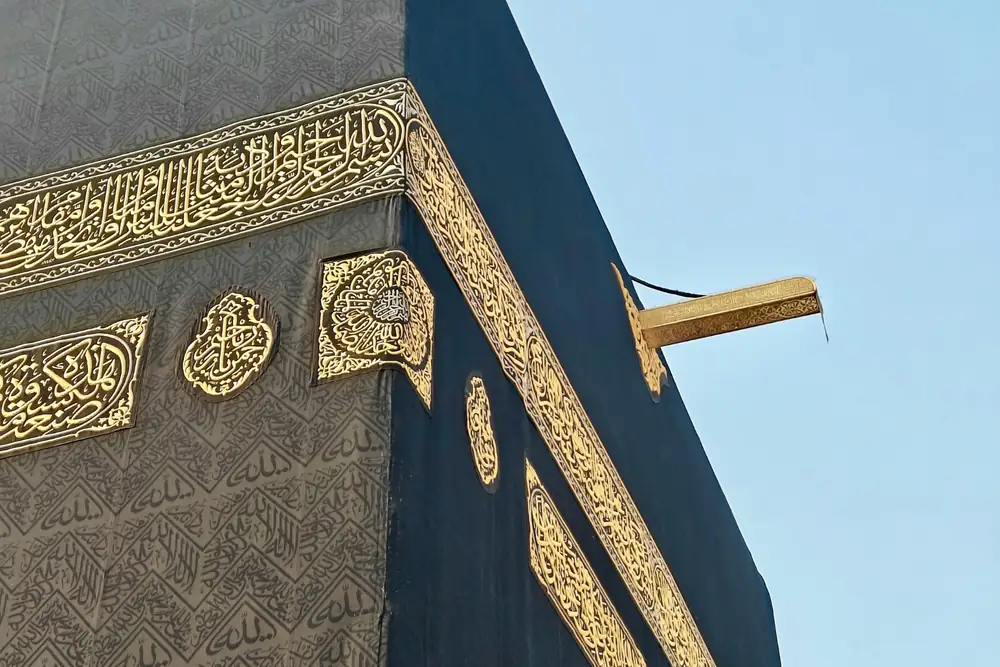 The Kaaba draped in the gold-embroidered Kiswah during Hajj