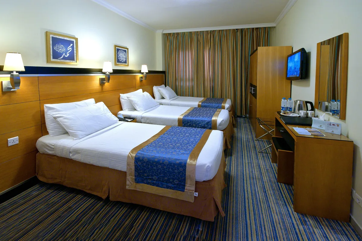 Triple room with three beds at Durrat Al Eiman