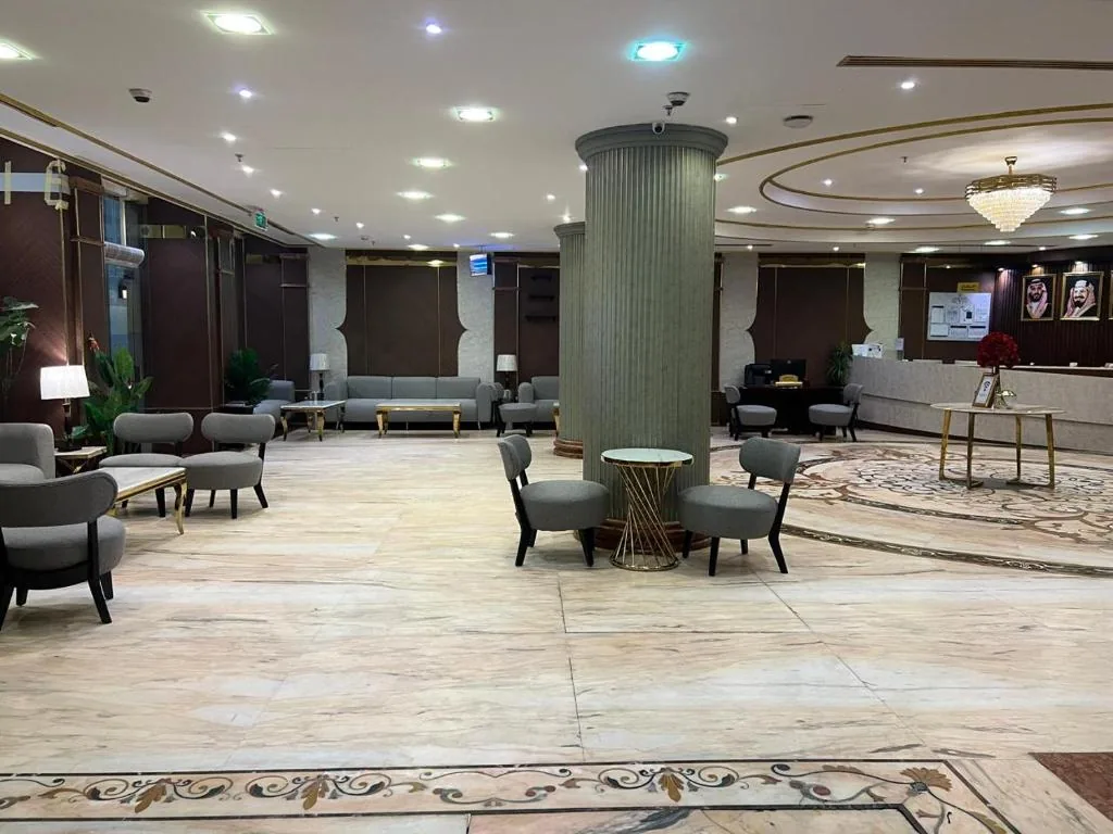 The lobby of Sky View Hotel, with armchairs around a central column