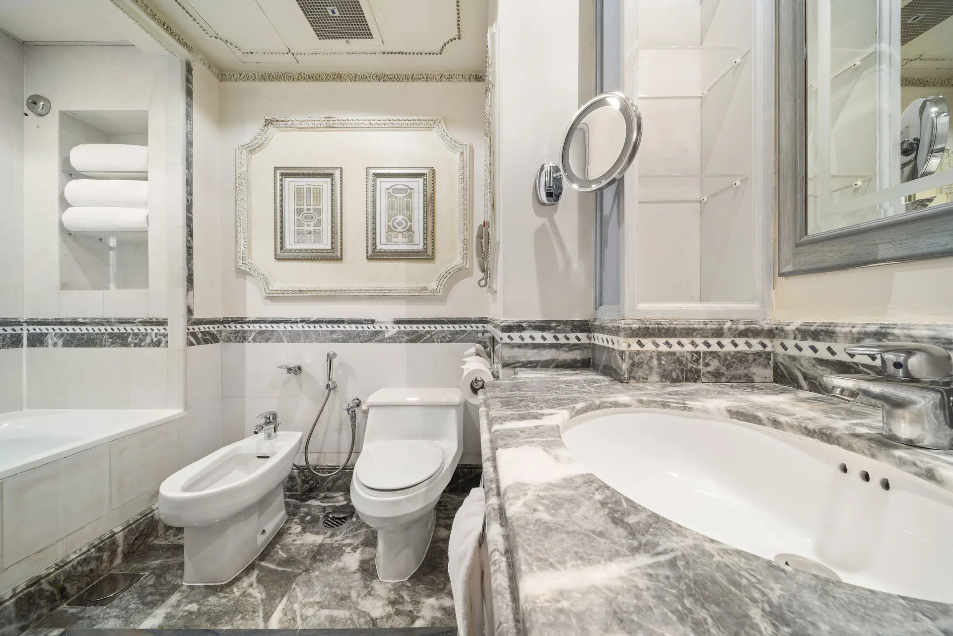 Bathroom with bathrobes and toiletries at InterContinental Dar Al Tawhid Makkah
