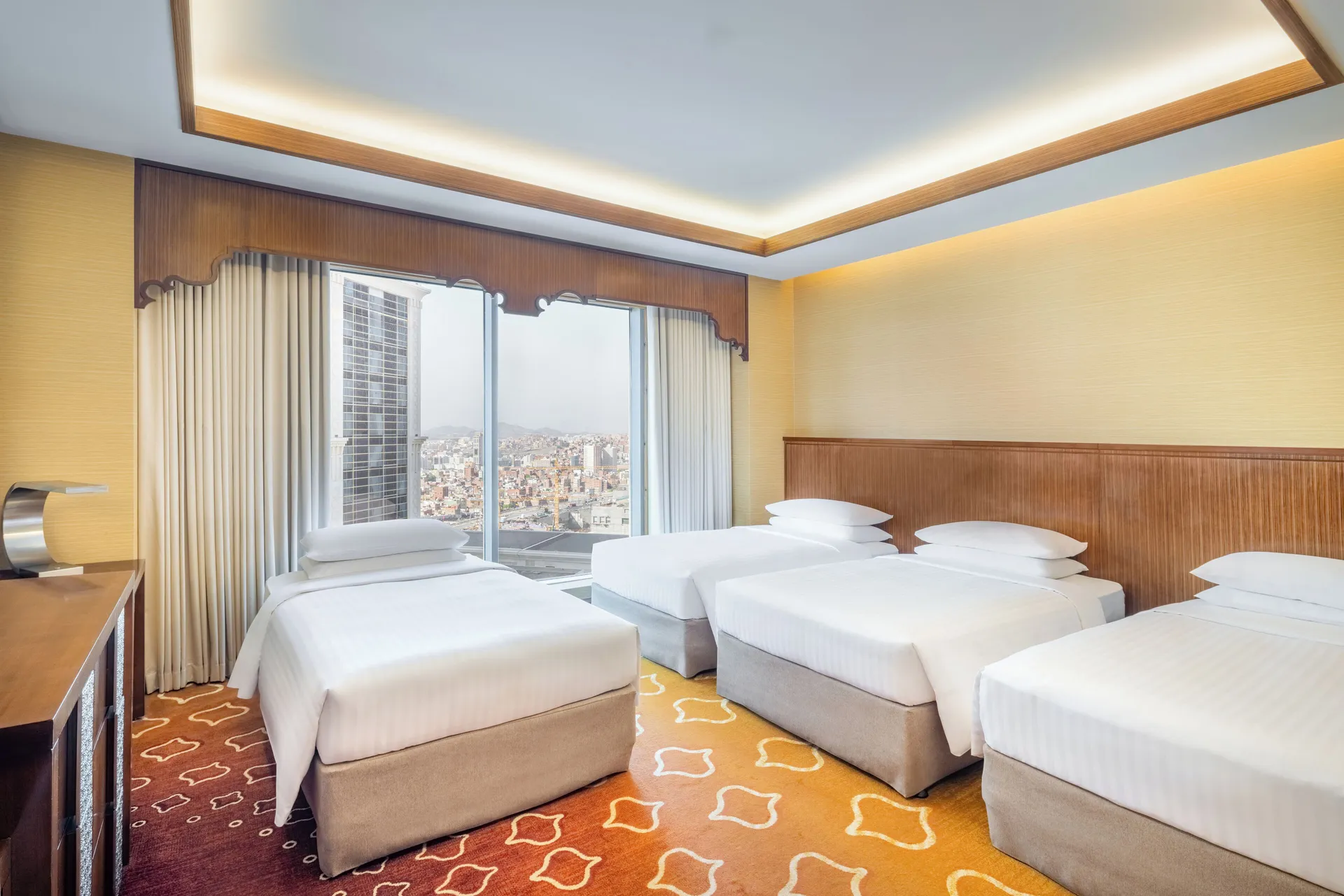 Minibar, premium bedding and desk at Jabal Omar Marriott Hotel Makkah