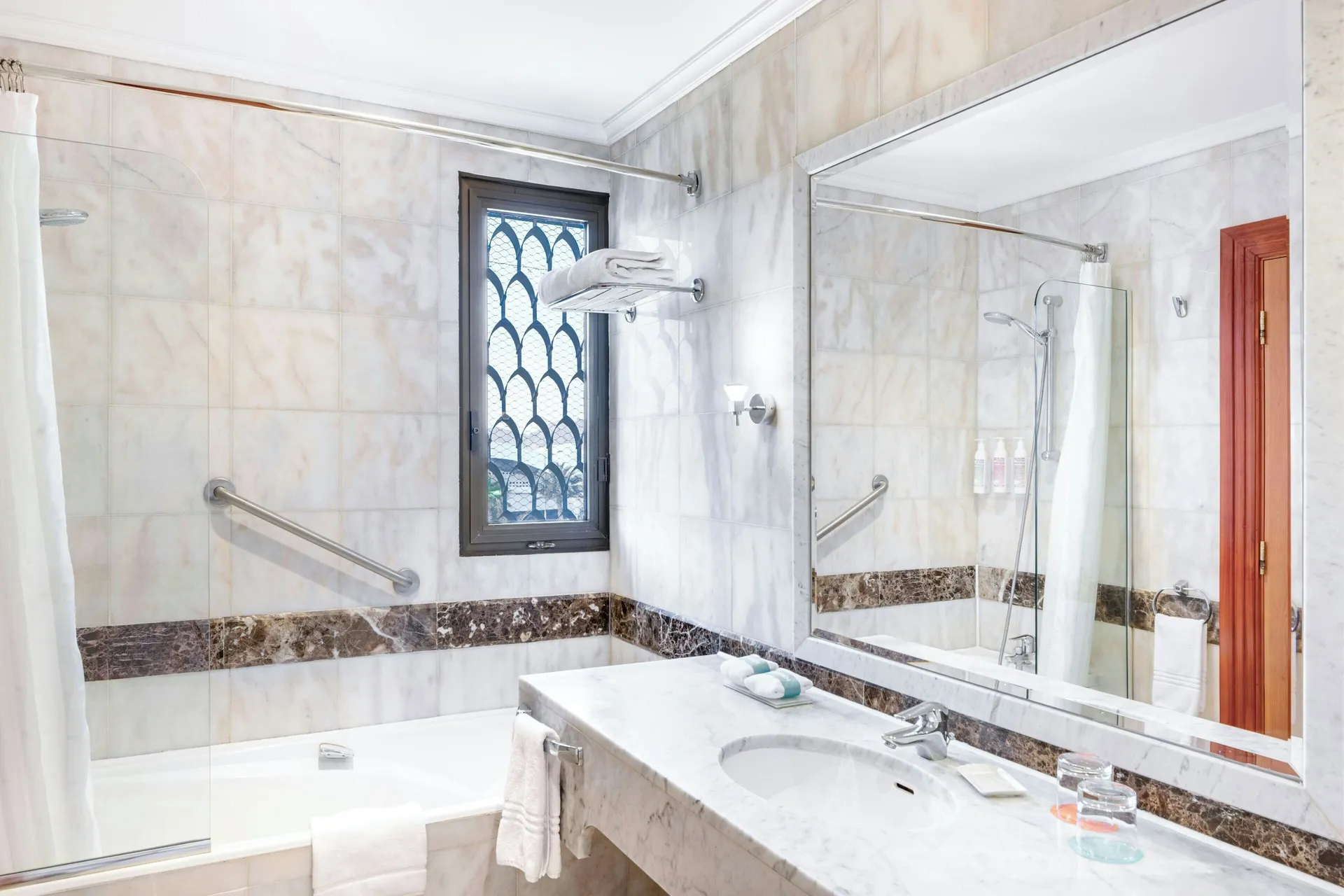 Rainfall showerhead, bathrobes, hair dryer, free toiletries at Le Méridien Medina