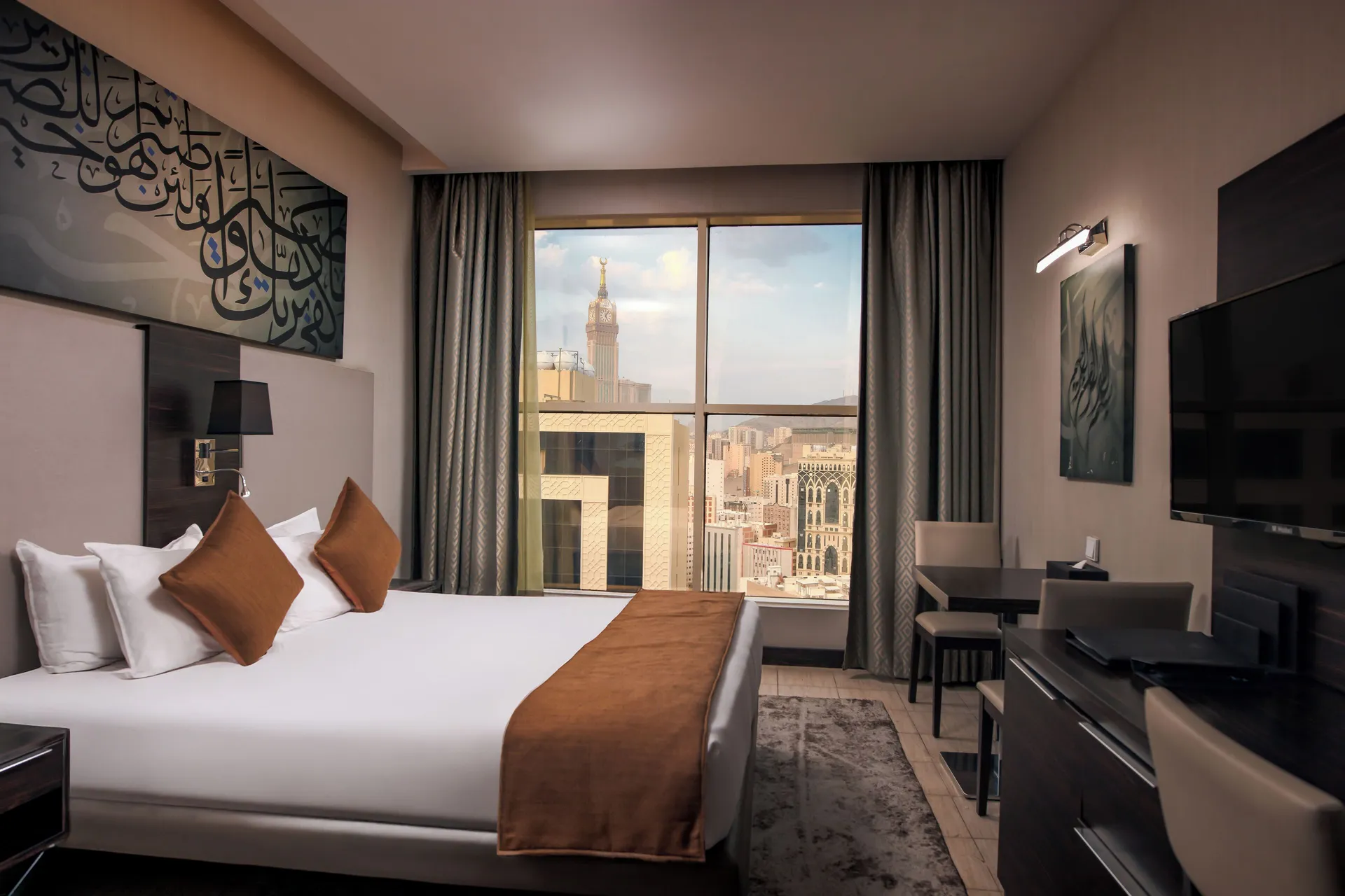In-room safe, free cots/infant beds, desk, iron/ironing board at M Hotel Makkah by Millennium