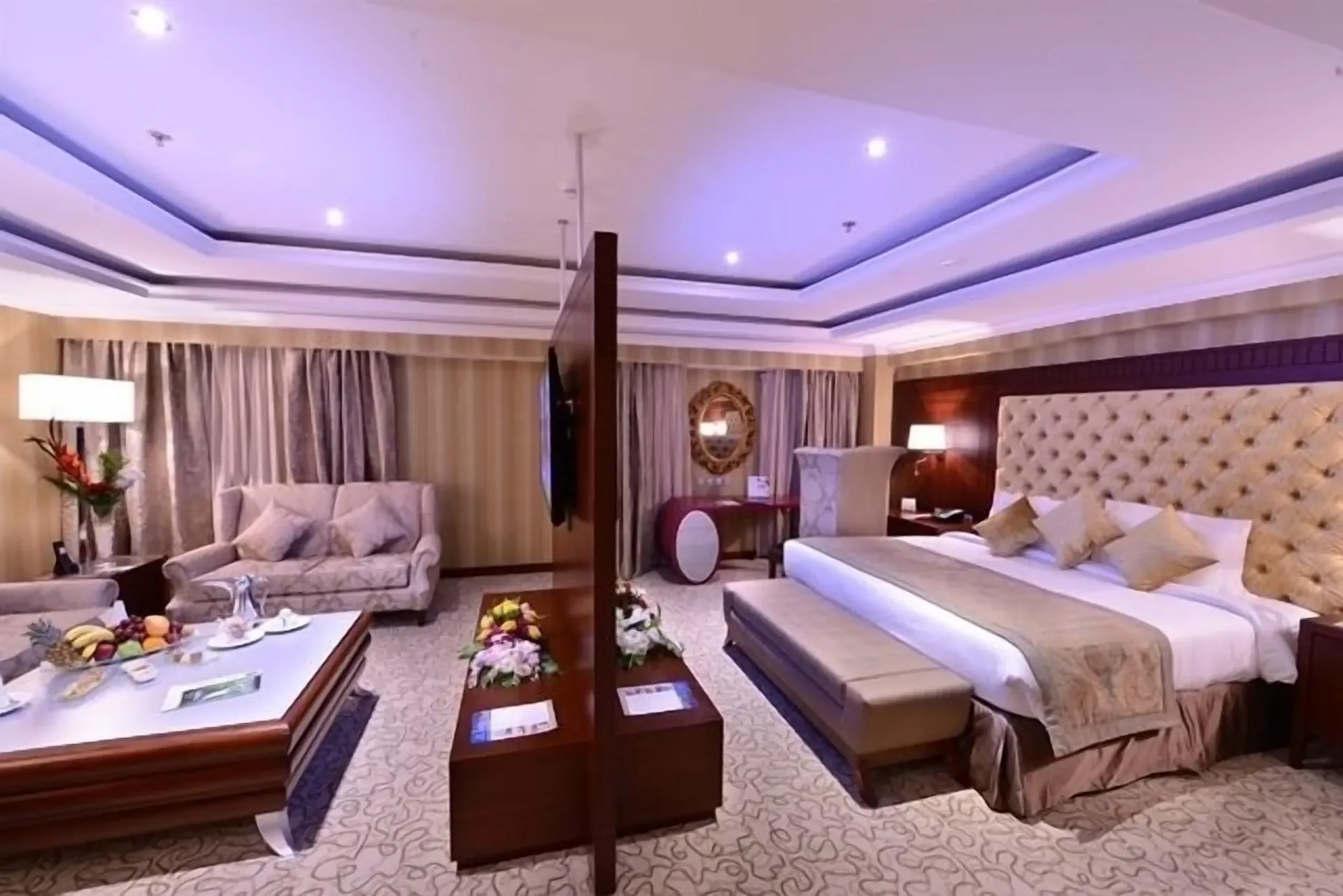 Minibar, in-room safe, iron/ironing board, blackout curtains at Millennium Al Aqeeq Hotel