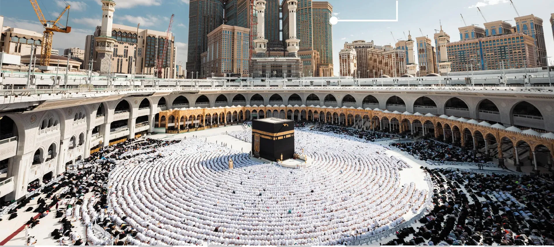 The Kaaba and Masjid al-Haram seen from above, with the clock tower complex behind them